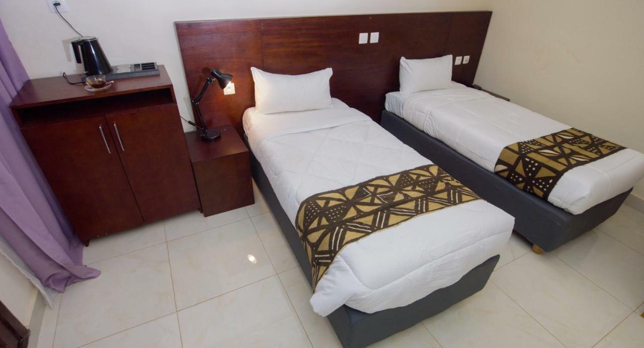Hotel La Rose Blanche Korhogo Exterior photo